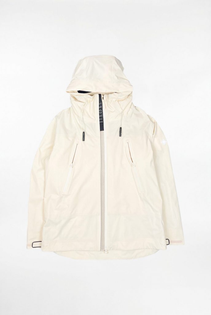 Beige SNØVIT Moonlighter X Outdoor-Jacke mit zwei Belüftungszippern vorne, aus robustem Nylon, wasserabweisend und winddicht.